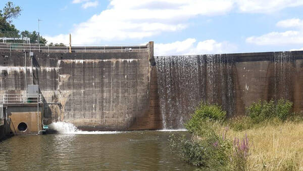 Col de cygne restitution débit réservé barrage